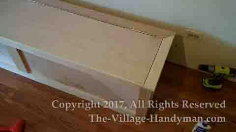 Custom furniture bench for kitchen storage with hinged lid 